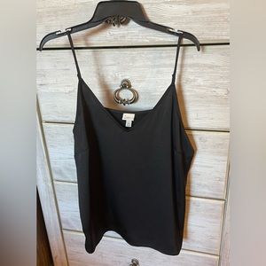 Black silky cami. A new day. Never worn Size XXL